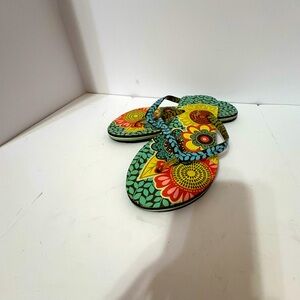 Vera Bradley flip flops featuring a vibrant floral pattern size Lg.